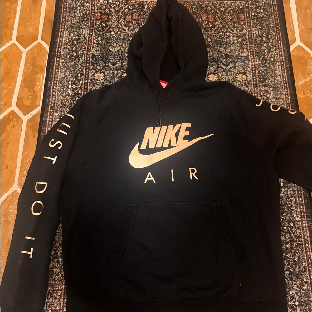 Nike Air Just Do It XL black hoodie. All text is in metallic gold. Fits like L